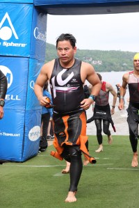 Coming out of the water, not too happy but determined to make some time up in T1.